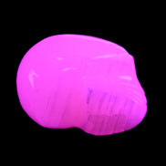 Mangano Calcite skull 30*47*35mm 81g in UV light - Rocks and Things Store