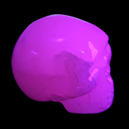 Mangano Calcite skull 45*60*57mm 199g in UV light - Rocks and Things Store