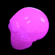 Mangano Calcite skull 45*60*57mm 199g in UV light - Rocks and Things Store