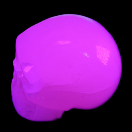 Mangano Calcite skull 45*60*57mm 199g in UV light - Rocks and Things Store