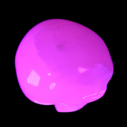 Mangano Calcite skull 45*60*57mm 199g in UV light - Rocks and Things Store