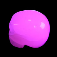 Mangano Calcite skull 45*60*57mm 199g in UV light - Rocks and Things Store