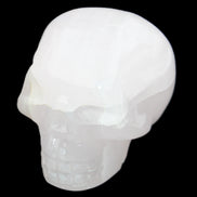 Mangano Calcite skull 45*60*57mm 199g in sunlight - Rocks and Things Store