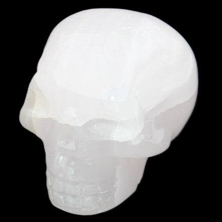 Mangano Calcite skull 45*60*57mm 199g in sunlight - Rocks and Things Store