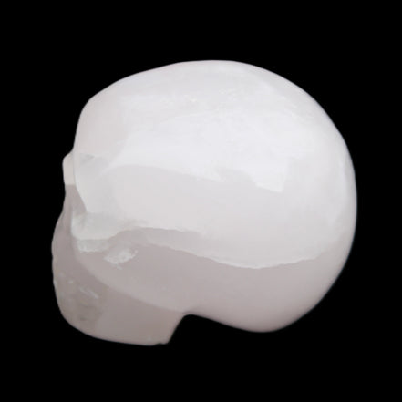Mangano Calcite skull 45*60*57mm 199g in sunlight - Rocks and Things Store