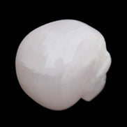 Mangano Calcite skull 45*60*57mm 199g in sunlight - Rocks and Things Store