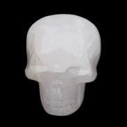 Mangano Calcite skull 45*60*57mm 199g in sunlight - Rocks and Things Store