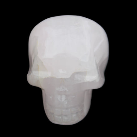Mangano Calcite skull 45*60*57mm 199g in sunlight - Rocks and Things Store