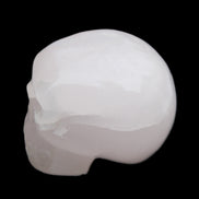 Mangano Calcite skull 45*60*57mm 199g in sunlight - Rocks and Things Store