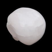 Mangano Calcite skull 45*60*57mm 199g in sunlight - Rocks and Things Store