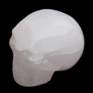 Mangano Calcite skull 45*60*57mm 199g in sunlight - Rocks and Things Store
