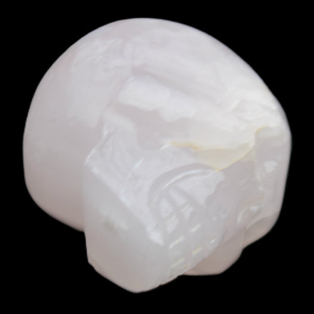Mangano Calcite skull 45*60*57mm 199g in sunlight - Rocks and Things Store