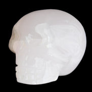 Mangano Calcite skull 45*60*57mm 199g in sunlight - Rocks and Things Store