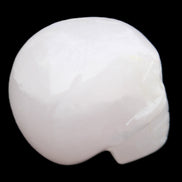 Mangano Calcite skull 45*60*57mm 199g in sunlight - Rocks and Things Store