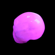 Mangano Calcite skull 30*42*35mm 77g in UV light - Rocks and Things Store