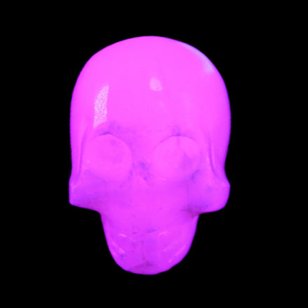 Mangano Calcite skull 30*42*35mm 77g in UV light - Rocks and Things Store