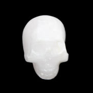 Mangano Calcite skull 30*42*35mm 77g in sunlight - Rocks and Things Store