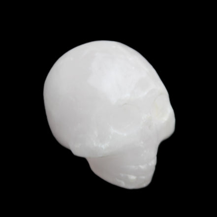Mangano Calcite skull 30*42*35mm 77g in sunlight - Rocks and Things Store