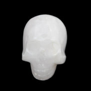 Mangano Calcite skull 30*42*35mm 77g in sunlight - Rocks and Things Store
