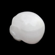 Mangano Calcite skull 30*42*35mm 77g in sunlight - Rocks and Things Store