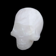 Mangano Calcite skull 30*42*35mm 77g in sunlight - Rocks and Things Store