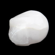 Mangano Calcite skull 30*42*35mm 77g in sunlight - Rocks and Things Store