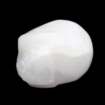 Mangano Calcite skull 30*42*35mm 77g in sunlight - Rocks and Things Store