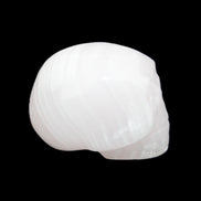 Mangano Calcite skull 30*47*36mm 85g in sunlight - Rocks and Things Store