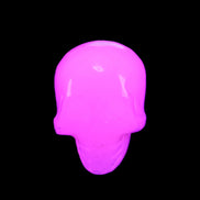 Mangano Calcite skull 30*47*36mm 85g in UV light - Rocks and Things Store
