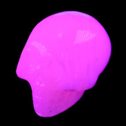 Mangano Calcite skull 30*47*36mm 85g in UV light - Rocks and Things Store