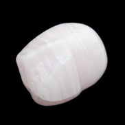 Mangano Calcite skull 30*47*36mm 85g in sunlight - Rocks and Things Store