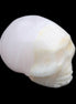 Mangano Calcite skull 31*46*36mm 83g in sunlight - Rocks and Things Store