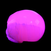 Mangano Calcite skull 31*46*36mm 83g in UV light - Rocks and Things Store