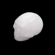 Mangano Calcite skull 30*45*38mm 78g in sunlight - Rocks and Things Store