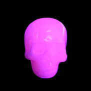 Mangano Calcite skull 30*45*38mm 78g in UV light - Rocks and Things Store