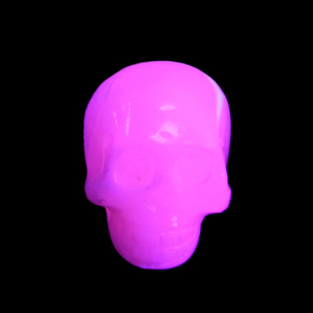 Mangano Calcite skull 30*45*38mm 78g in UV light - Rocks and Things Store