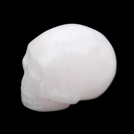 Mangano Calcite skull 30*45*38mm 78g in sunlight - Rocks and Things Store