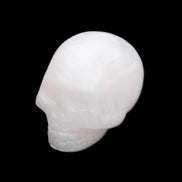 Mangano Calcite skull 30*45*38mm 78g in sunlight - Rocks and Things Store
