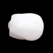 Mangano Calcite skull 30*45*38mm 78g in sunlight - Rocks and Things Store
