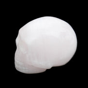 Mangano Calcite skull 30*45*38mm 78g in sunlight - Rocks and Things Store