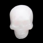 Mangano Calcite skull 30*45*38mm 78g in sunlight - Rocks and Things Store