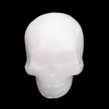 Mangano Calcite skull 30*45*38mm 78g in sunlight - Rocks and Things Store