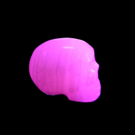 Mangano Calcite skull 30*42*35mm 83g in UV light - Rocks and Things Store