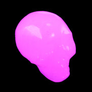 Mangano Calcite skull 30*42*35mm 83g in UV light - Rocks and Things Store