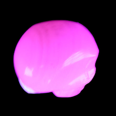 Mangano Calcite skull 30*42*35mm 83g in UV light - Rocks and Things Store