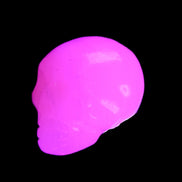 Mangano Calcite skull 30*42*35mm 83g in UV light - Rocks and Things Store