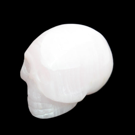 Mangano Calcite skull 30*42*35mm 83g in sunlight - Rocks and Things Store