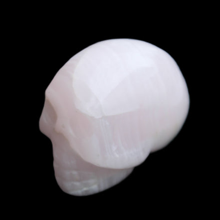 Mangano Calcite skull 30*42*35mm 83g in sunlight - Rocks and Things Store