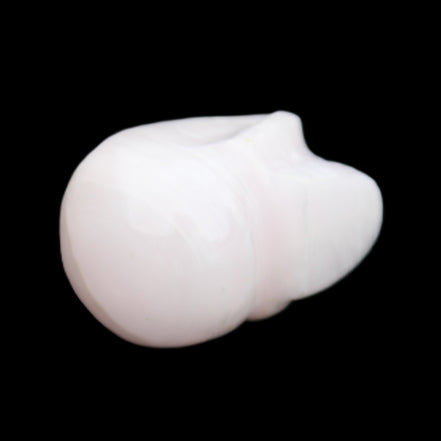 Mangano Calcite skull 30*42*35mm 83g in sunlight - Rocks and Things Store