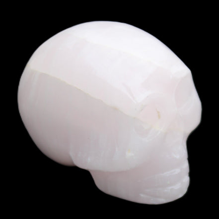 Mangano Calcite skull 30*42*35mm 83g in sunlight - Rocks and Things Store